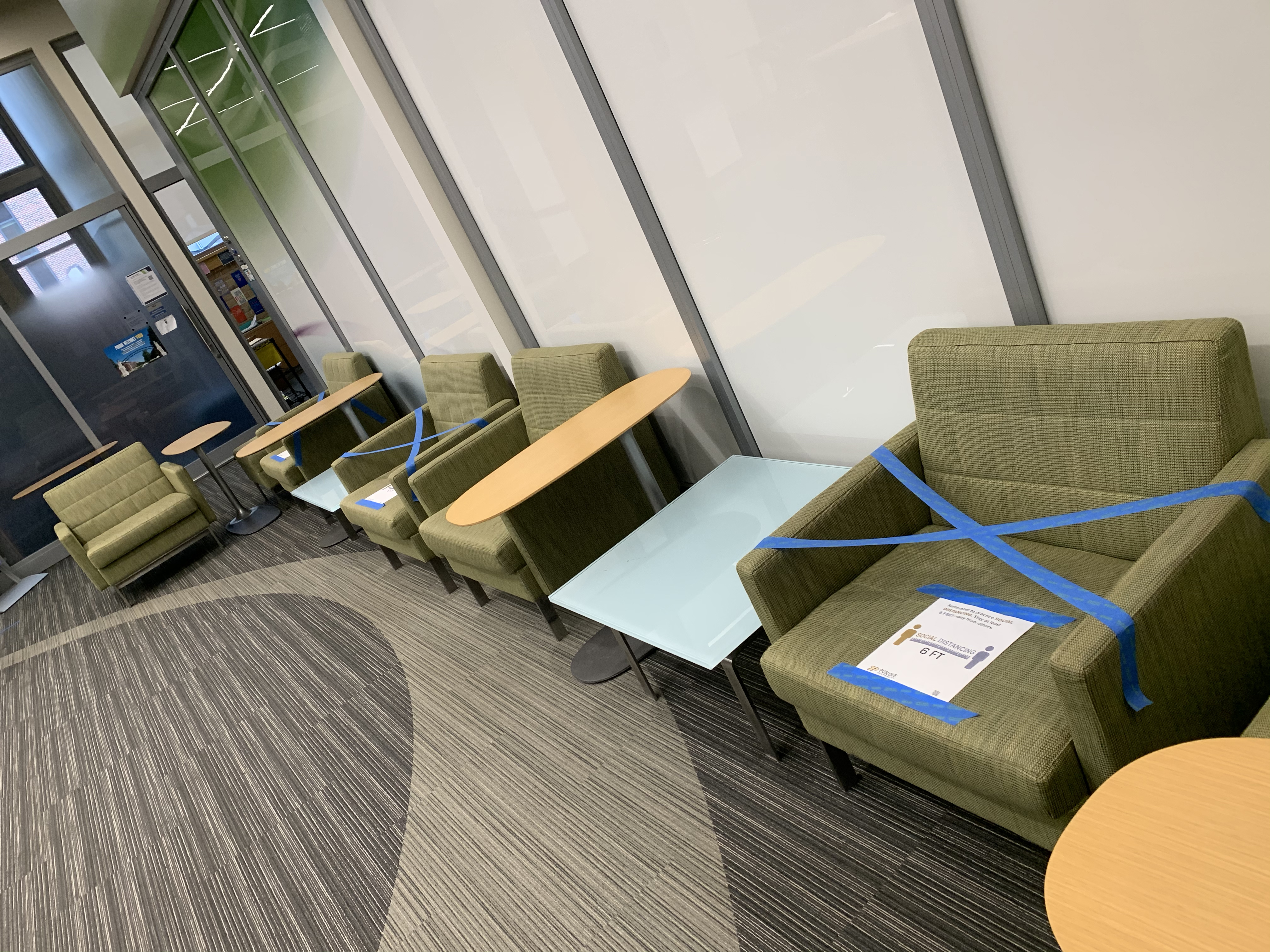 Grssom Hall Lobby chairs marked for social distancing